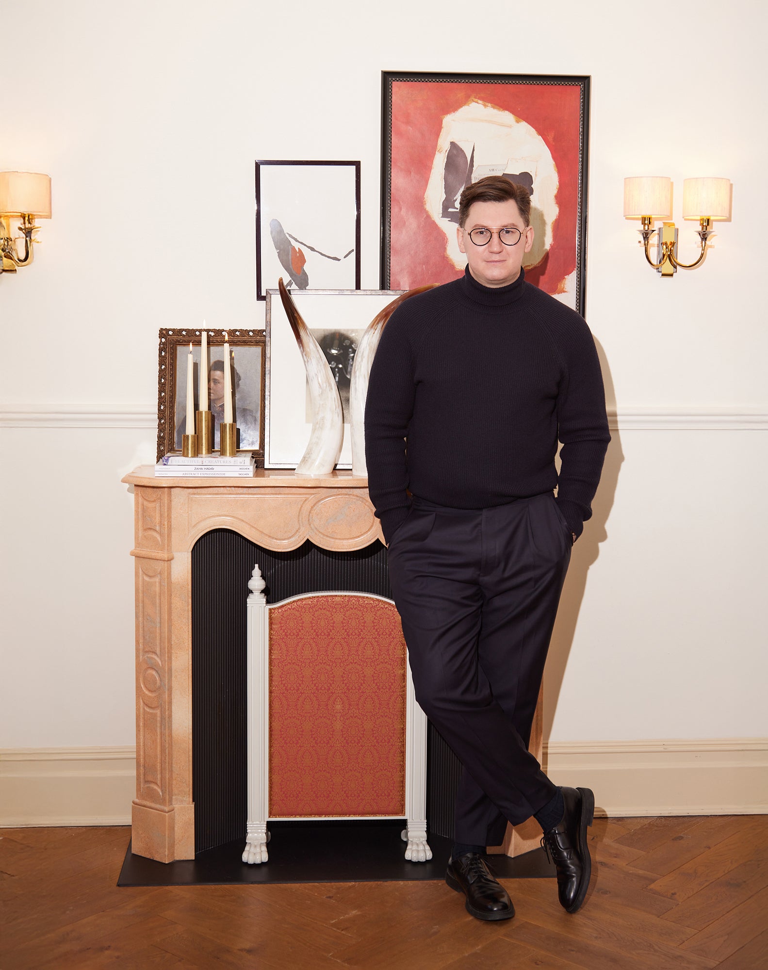 Jewellery Artist, Giacomo Ciufolli Standing by Fire Place