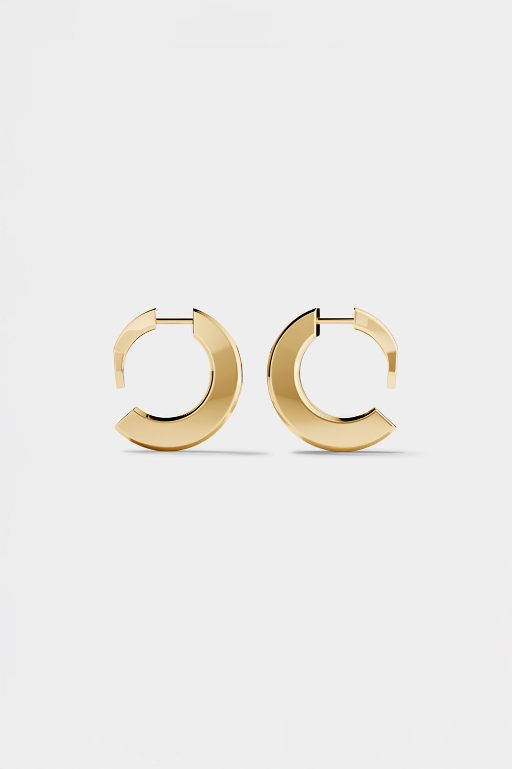 Ciufoli One sculptural small yellow gold earrings side view