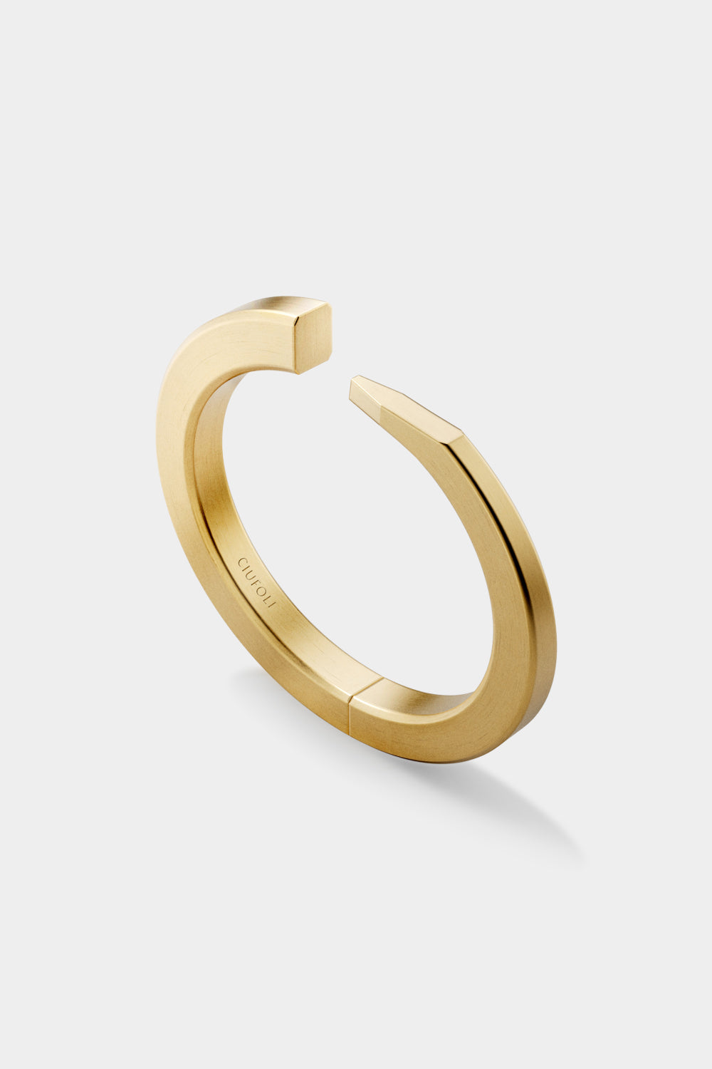 Ciufoli One sculptural yellow gold cuff bracelet side view