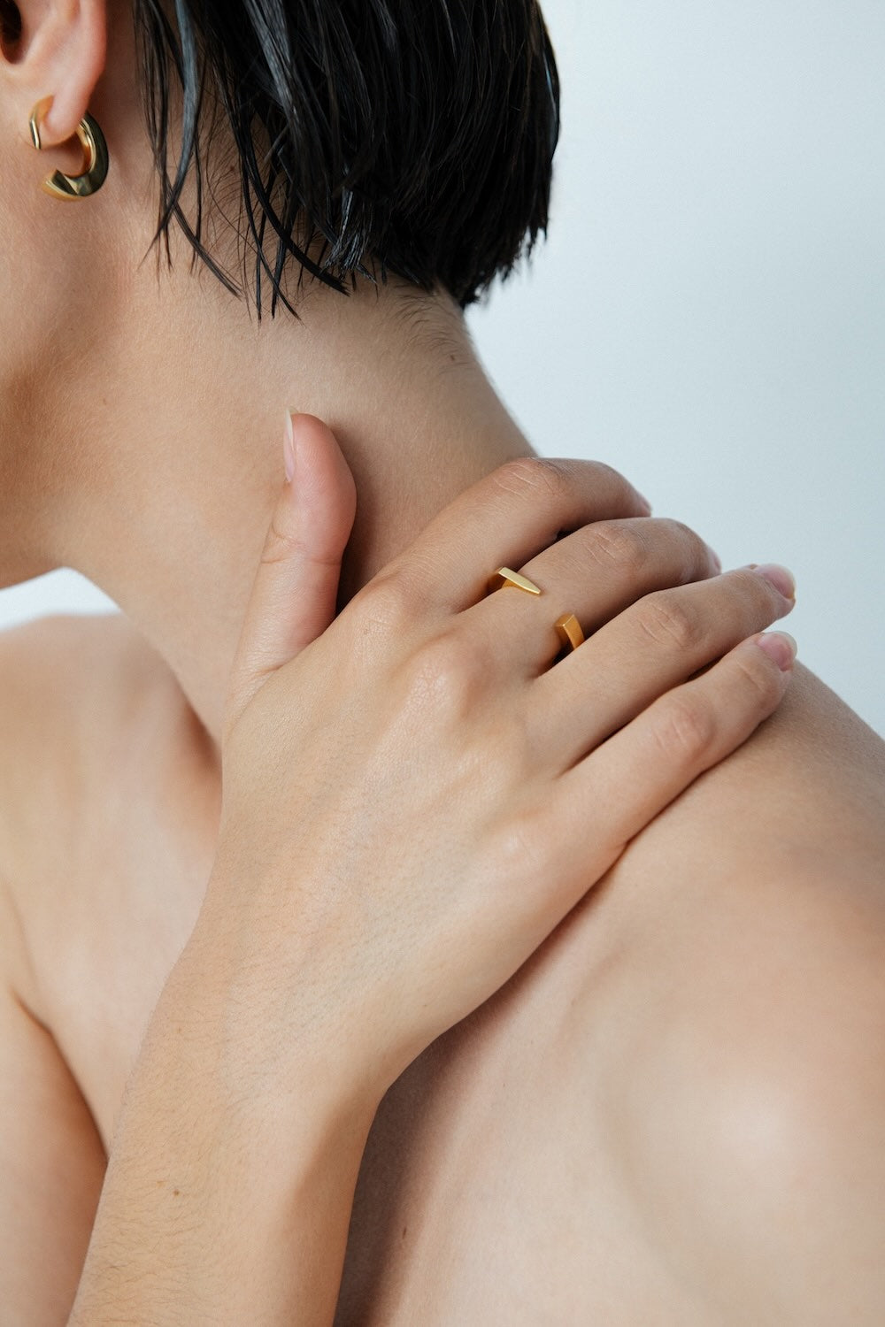 Ciufoli One sculptural yellow gold ring on model 